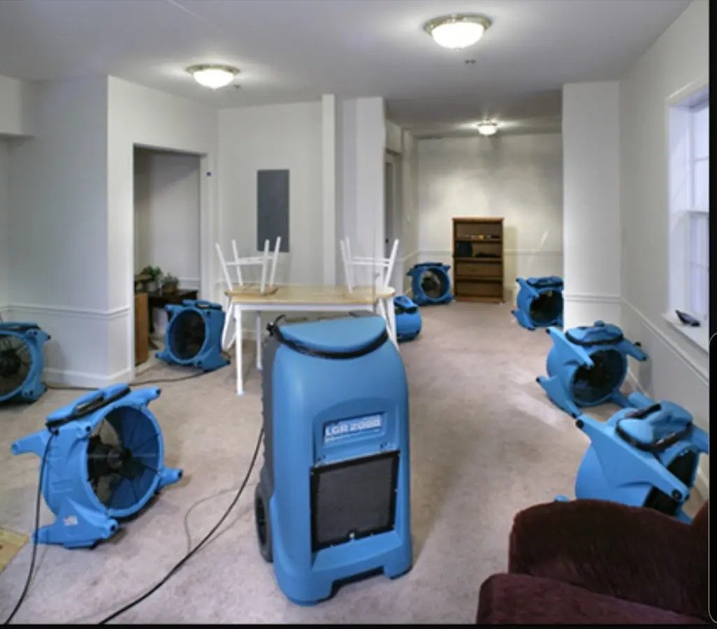 Air movers and dehumidifier setup for Water Damage Restoration in Camillus